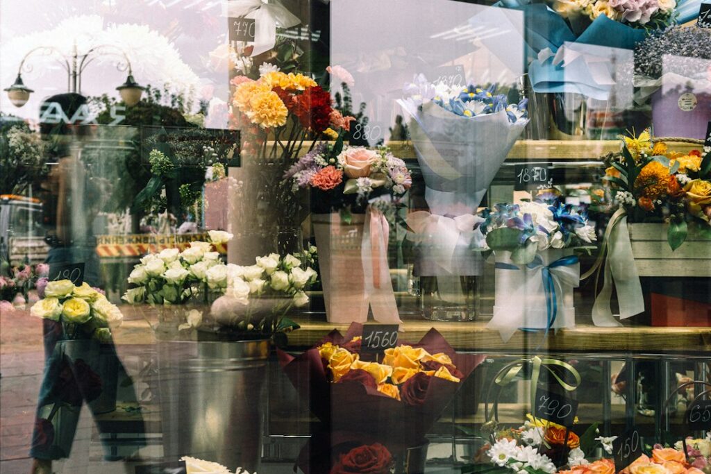 Refrigerated flower cooler stocked with bouquets