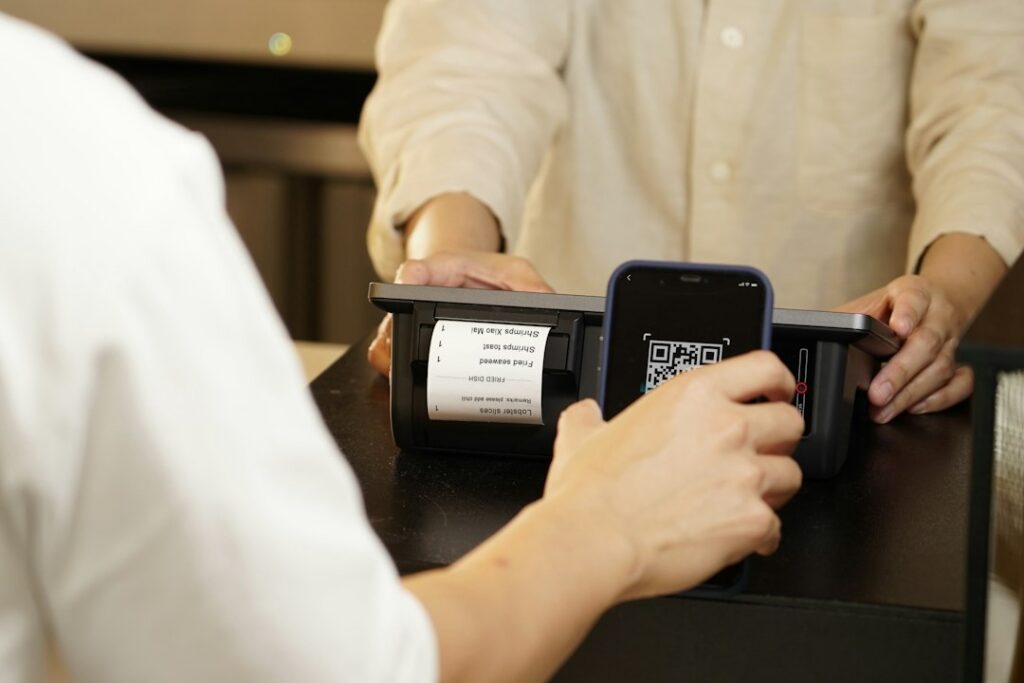 Calculator and sales receipts on a counter