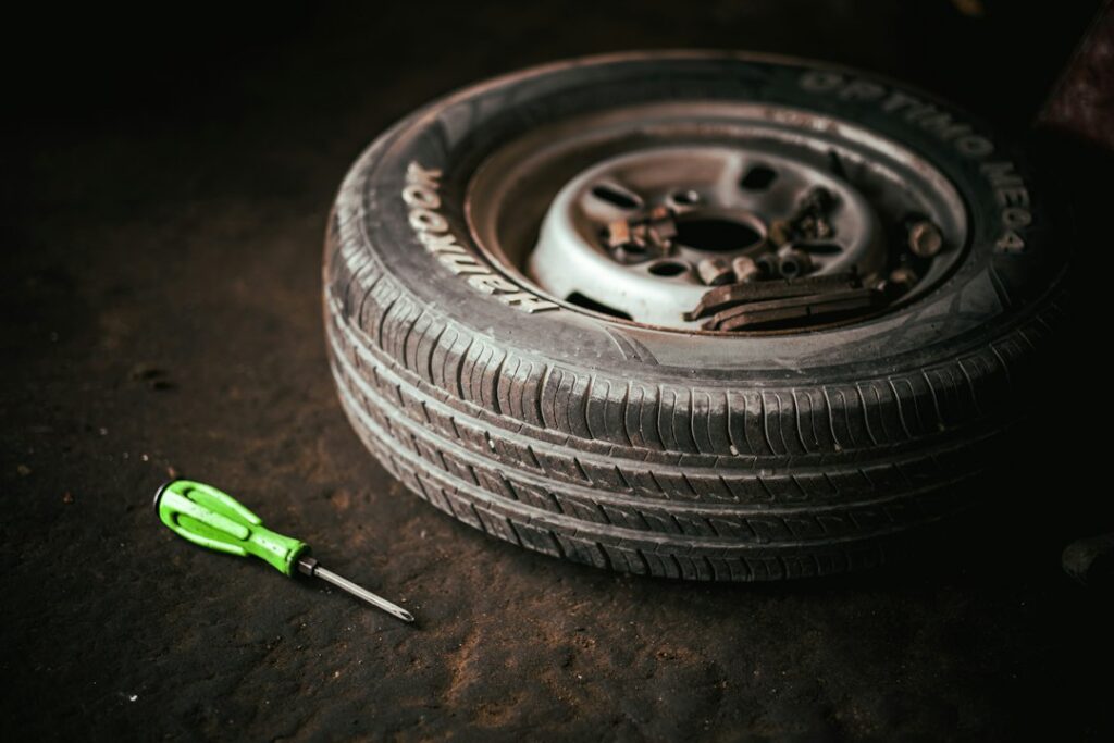 Stacked tires on racks in a repair shop