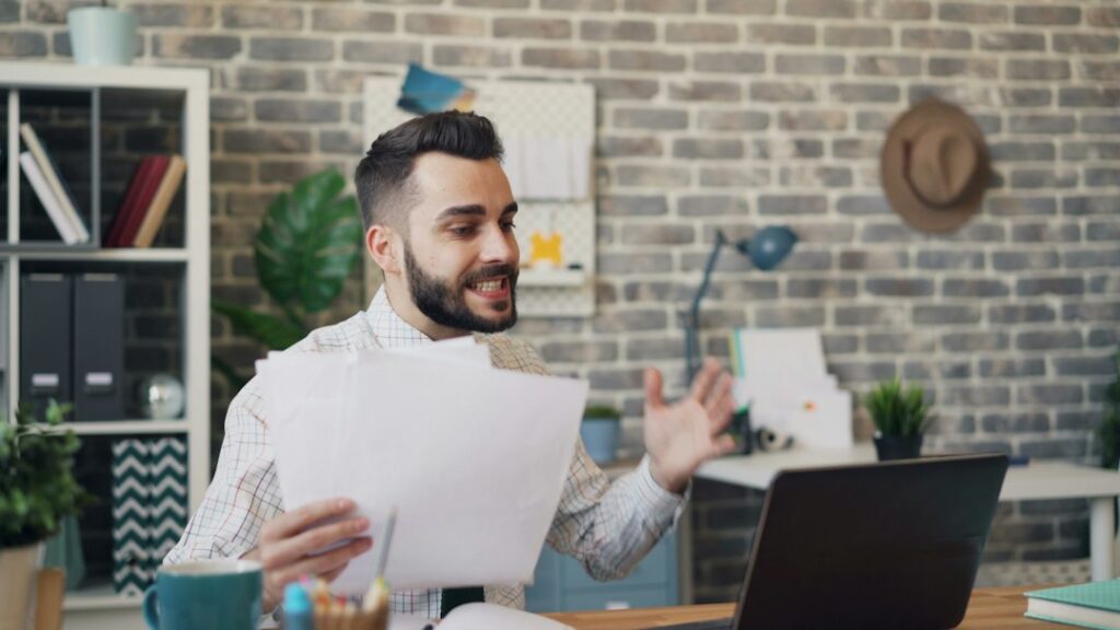 Owner reviewing bank statements and a financing contract