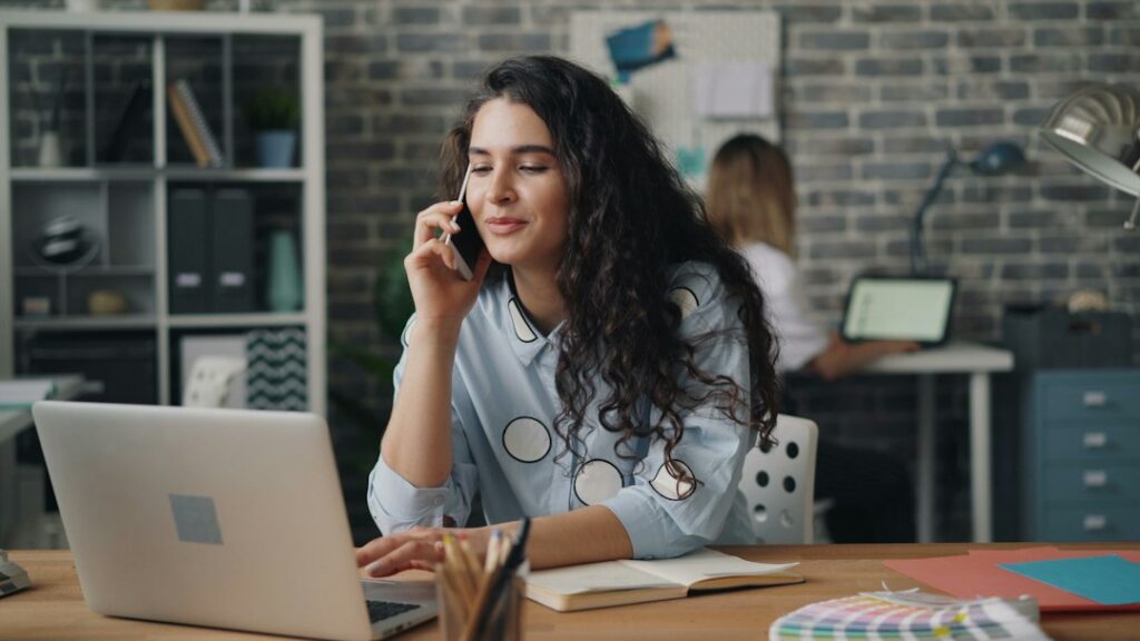 Owner reviewing a contract while on the phone