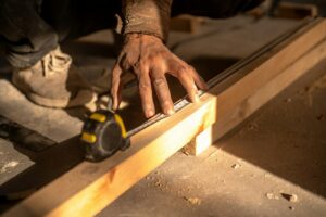 Flooring contractor installing hardwood floors