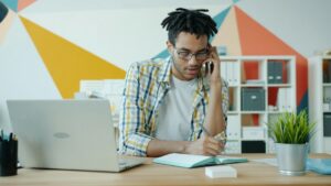 Business owner reviewing an insurance invoice