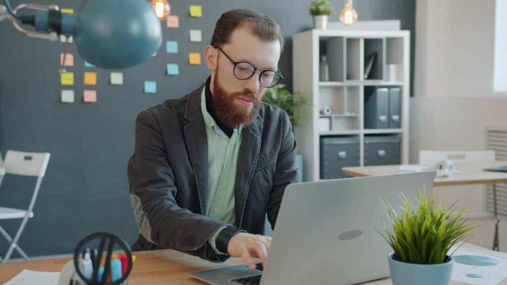 Owner meeting with an advisor in a small office