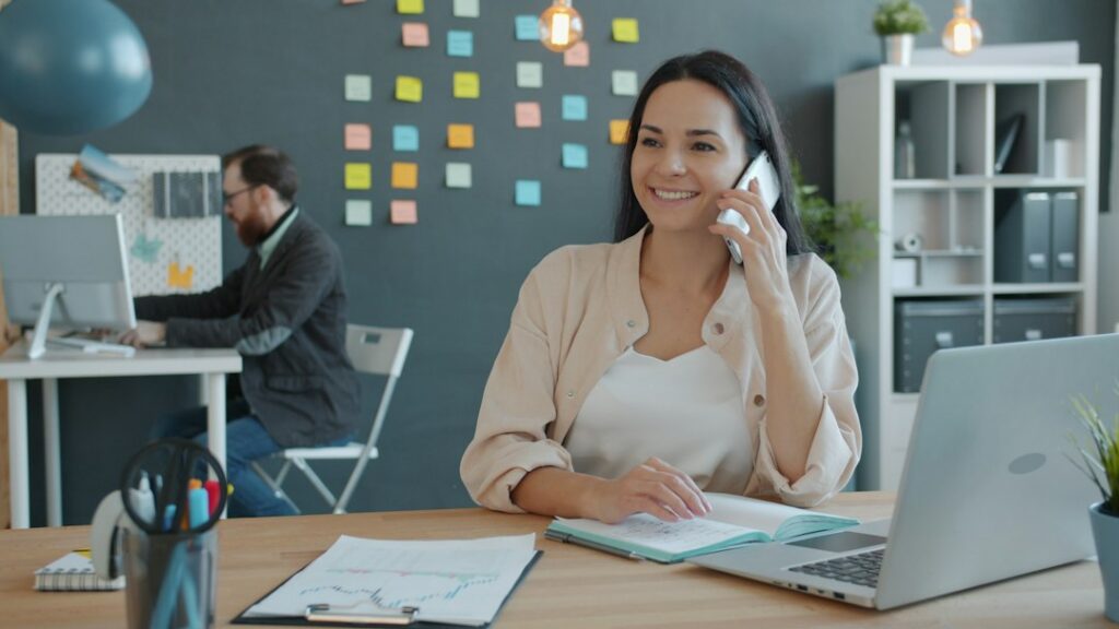 Business owner taking a call about a financing offer