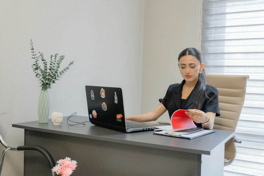 Owner reviewing a financing contract at a desk