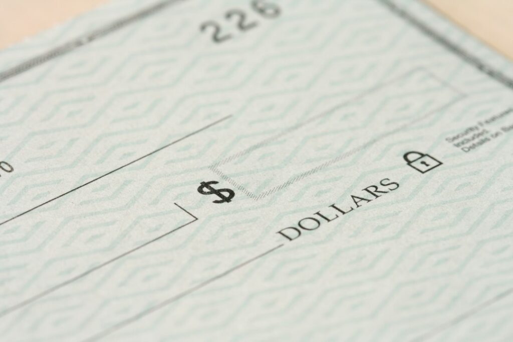 Close-up of a bank statement showing overdraft fee line items