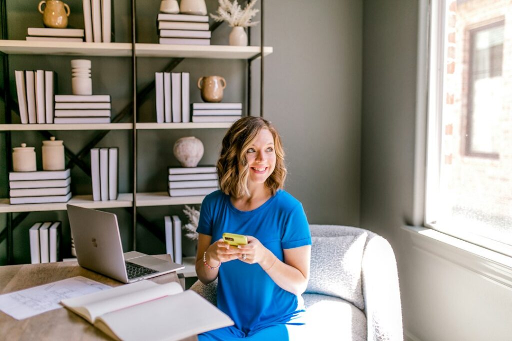 Business owner and advisor reviewing financial documents across a small desk