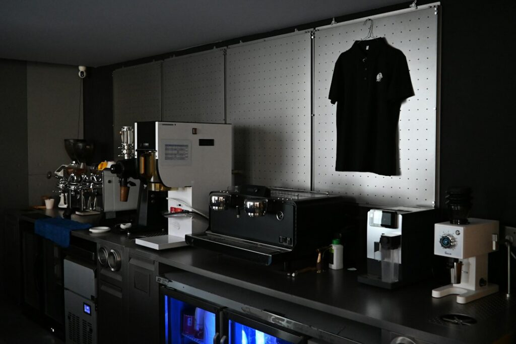 New espresso machine being installed in a small coffee shop