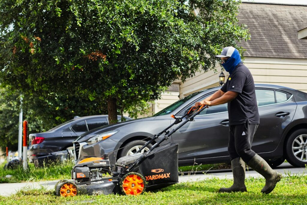 Landscaping equipment parked in a yard in autumn
