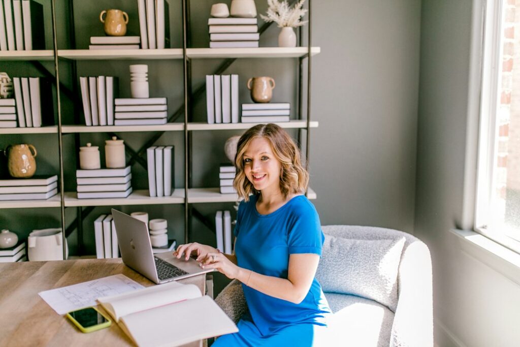 Business owner and advisor reviewing documents across a small desk