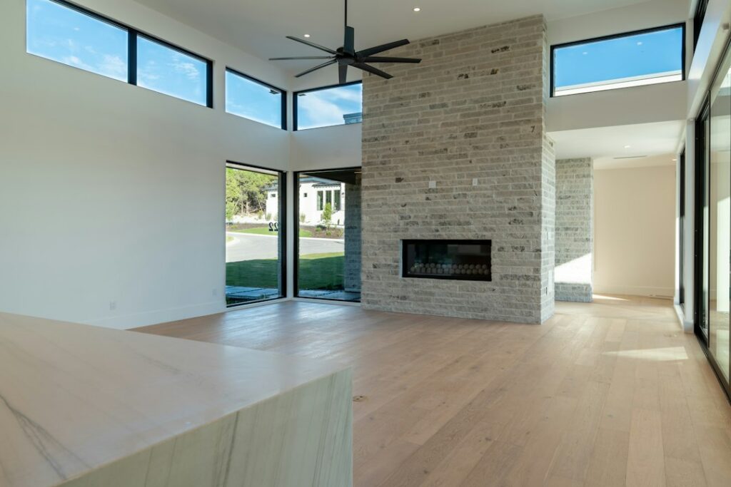 Flooring contractor measuring a hardwood floor